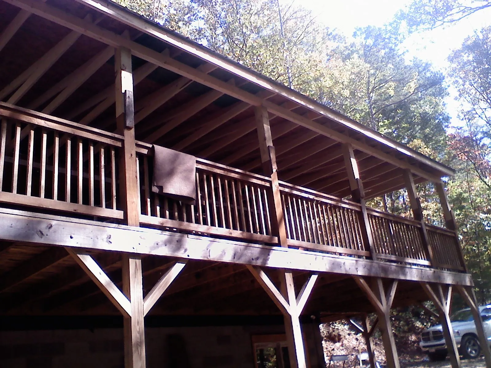 Timber framing under a new elevated porch and deck — Roof Leak Repair in Munson by Roofing Brothers